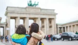 Mother and child looking at the Brandenburg Gate, Berlin