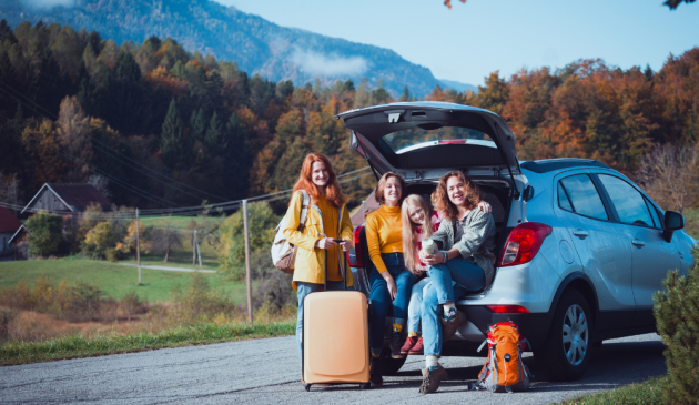 family on holiday in car
