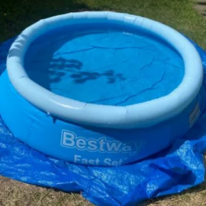 Bestway BW57392 Fast Set Swimming Pool being used on a lawn