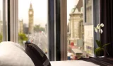 Family hotel room with a view of Westminster and Big Ben in London