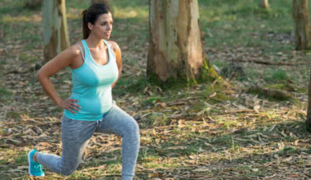 Female runner doing stretches