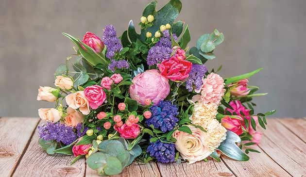 Bunch of flowers on table