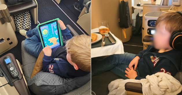 Two children are entertained on a business class flight with Etihad airways