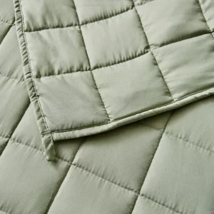 A close up of the pattern of the Fogarty Calm and Cosy Weighted Blanket