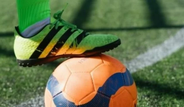 Football boot and football