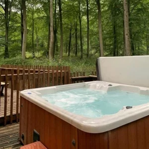 A hot tub in a log cabin at Forest Holidays Blackwood Forest