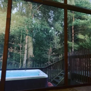 A hot tub in a log cabin at Forest Holidays Cropton Forest