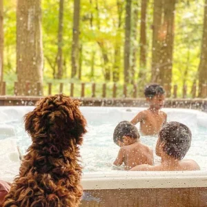 Kids in a hot tub at the Forest of Dean Forest Holidays site in Gloucestershire