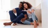 Couple checking pregnancy test