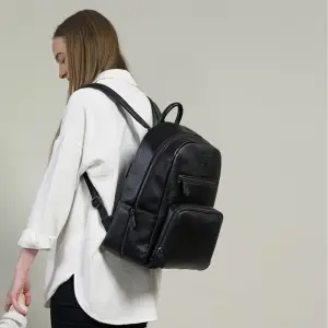 Gigil Bloom Changing Backpack on model's bag from behind