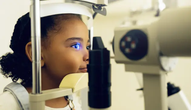 Girl at eye test