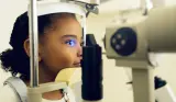 Girl at eye test