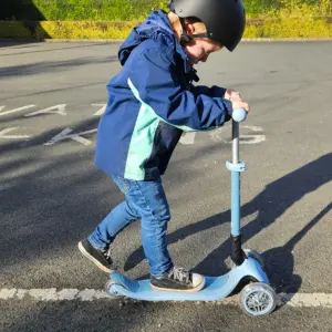 Child riding Globber Ecologic Scooter