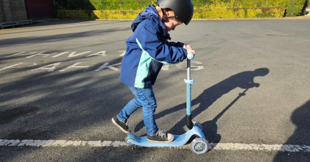 Child riding Globber Ecologic Scooter