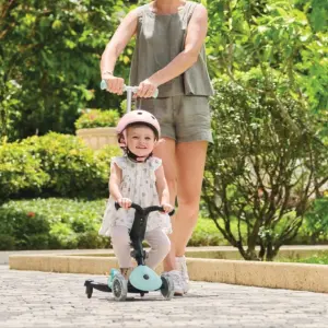 Woman pushing child on Globber Go Up Active Lights Scooter