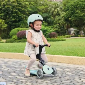 Child riding on Globber Go Up Active Lights Scooter
