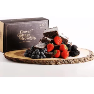 Gower Cottage Brownies stock image of brownies and berries on wooden platter