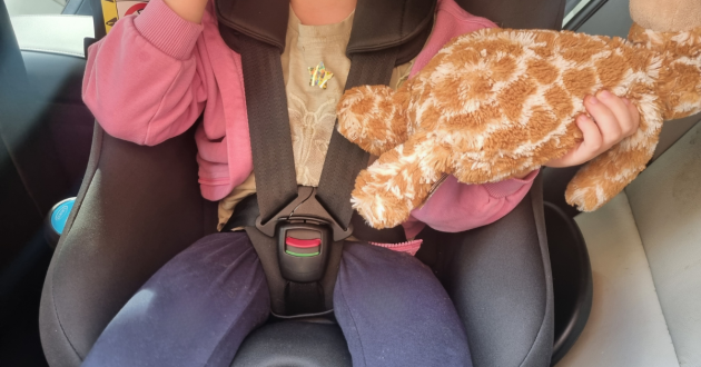 Child in Graco Turn2Me DLX car seat with 360-degree rotation