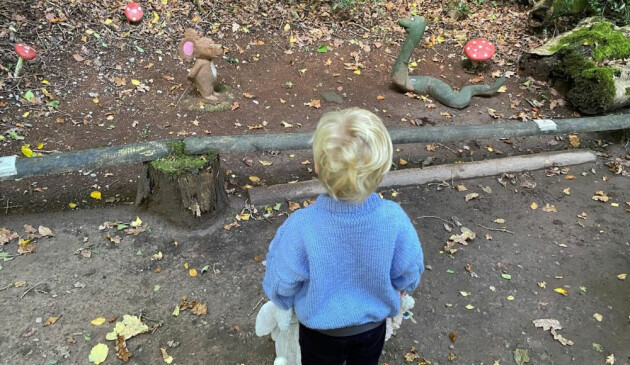 A child walking around the Gruffalo Party Trail at Beechenhurst