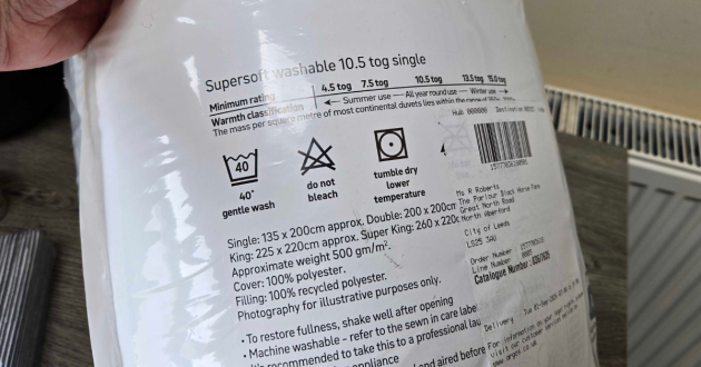 Habitat Supersoft 10.5 tog duvet care label showing washing instructions and materials