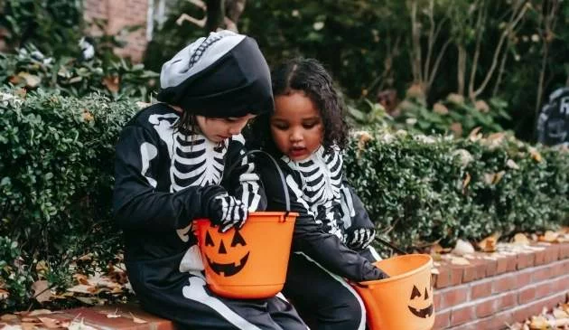 children in Halloween costumes