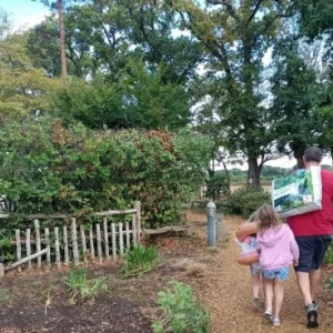 A family walking around Hoburne Bashley holiday park