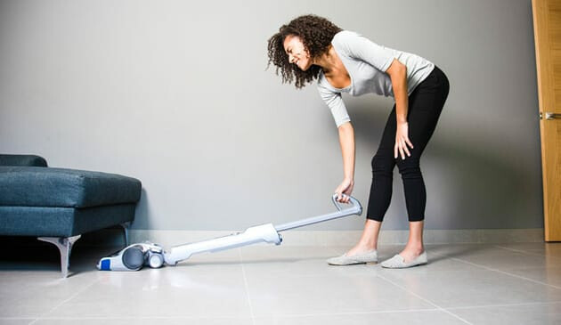 Woman hoovering