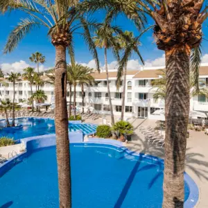 Hoposa Villaconcha aerial view of outdoor pool and palm trees