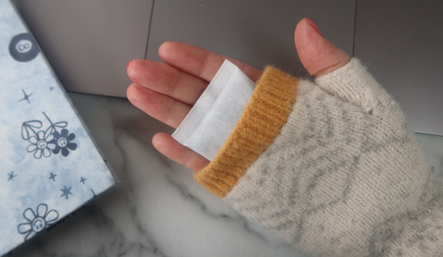 Hot Hands Instant Hand Warmers in a glove