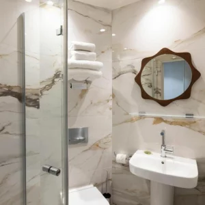 A bathroom at Hôtel Michelet Odéon in Paris
