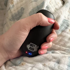 HotRox Electronic Hand Warmer in use indoors