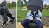 Mum pushing child in Ickle Bubba Pisces stroller