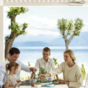 A family dining at Ikos Dassia in Corfu