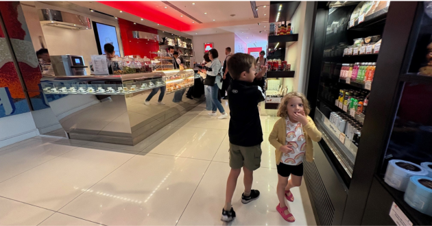 Kids entering the Illy Cafe at Park Plaza Westminster Bridge hotel