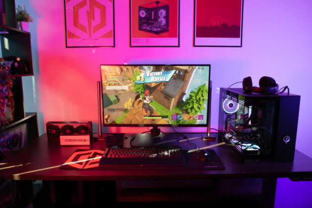 A custom PC gaming setup on a desk in a teenager's room