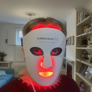 Natasha testing the CurrentBody LED Red Light Therapy Face Mask: Series 2