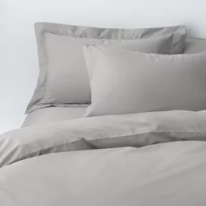 John Lewis Egyptian Cotton Percale 200 Thread Count bedding set on a double bed in a classic white bedroom