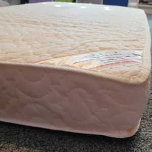 KATY cotbed mattress in testing close up