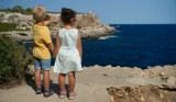 Kids looking out to sea in Mallorca