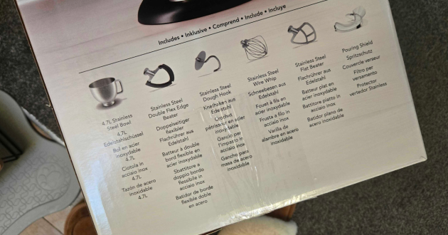 Box listing the accessories included in the KitchenAid Artisan Stand Mixer