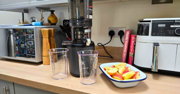 Prepped and ready to go, the Kuvings Augo6 before making apple juice atop the tester's countertop