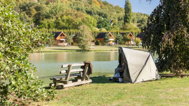 Fishing in the lake at Eurocamp La Croix du Vieux Pont