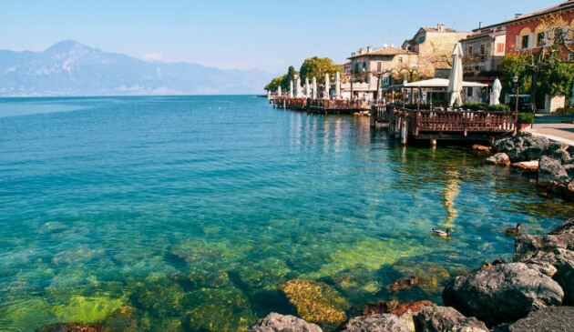 A view of the water's edge at Gardone Riviera on Lake Garda in Italy