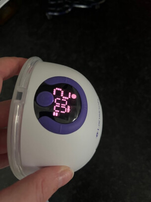 Lansinoh wearable breast pump review image showing pump in testing with display
