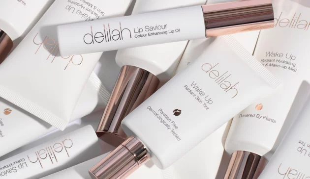 A view of delilah's Wake Up Range products laid all out on a white surface