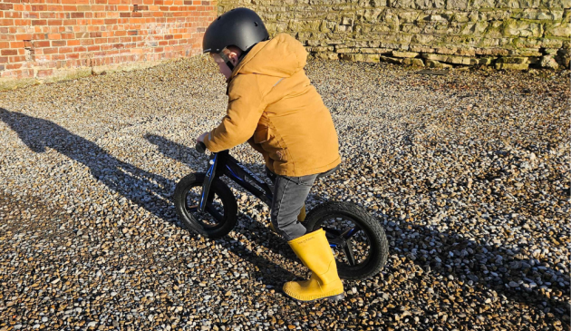 little boy on liferyder balance bike