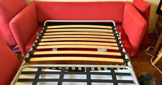 Loaf Squishmeister Sofa Bed unfolded to reveal its metal frame and curved wooden slats