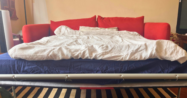 Red Loaf Squishmeister Sofa Bed fully unfolded and made up with white bedding