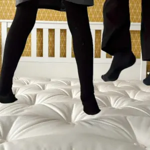 Children jump on Loaf Top Dog's mattress during testing