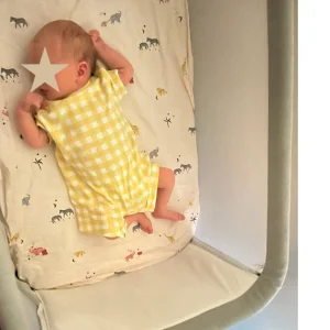 Baby sleeping in Mamas & Papas Lua Crib